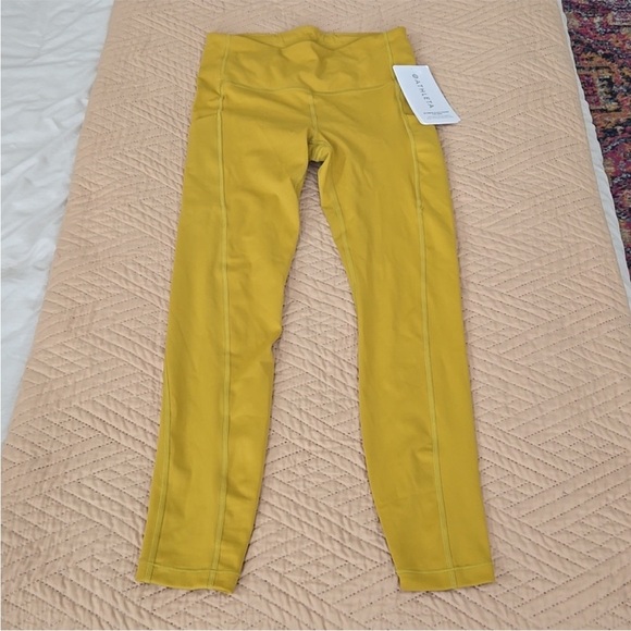 NWT Athleta ultimate stash 7/8 pocket leggings mustard yellow gold xs - Picture 2 of 7